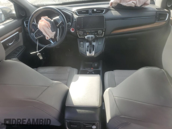2018 Honda CR-V Touring z VIN 7FARW2H94JE077885, wystawiony jako Copart lot #55451345 z przebiegiem 133 964 mil mil oraz Szkoda całkowita • Salvage title. Historia ofert i sprzedaży dostępna na DreamBid. Obrazek 8.