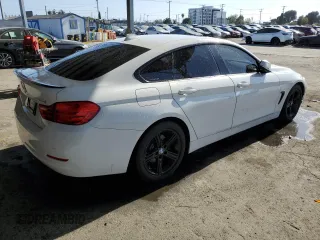 2015 BMW 4 Series 428i with VIN WBA4A9C5XFGL85882, listed as a Copart auction lot 57434445 with 145,765 mi miles and Salvage title. Bid and sale history available at DreamBid. Image 3.