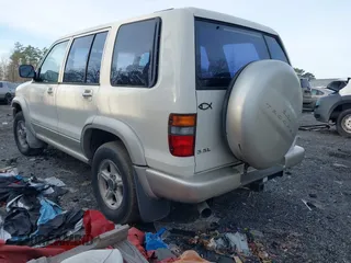 1999 Isuzu Trooper S with VIN JACDJ58X1X7928946, listed as a IAAI auction lot 41310880 with Not Provided miles and . Bid and sale history available at DreamBid. Image 3.