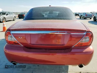2008 Jaguar XJ with VIN SAJWA79B58SH20211, listed as a Copart auction lot 46951055 with 144,655 mi miles and Salvage Title. Bid and sale history available at carsss.com. Image 6.