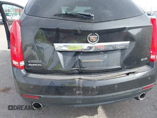 2013 Cadillac SRX Luxury Collection with VIN 3GYFNCE33DS617143, listed as a IAAI auction lot 41876084 with 102,512 mi miles. Bid and sale history available at carsss.com. Image 6.