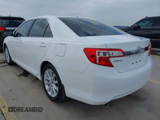 2014 Toyota Camry SE with VIN 4T1BK1FK5EU551196, listed as a IAAI auction lot 41912297 with 104,445 mi miles. Bid and sale history available at carsss.com. Image 3.