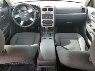2009 Dodge Charger SE z VIN 2B3KA43D09H512377, wystawiony jako Copart lot #46854745 z przebiegiem 169 700 mil mil oraz Szkoda całkowita • Salvage title. Historia ofert i sprzedaży dostępna na DreamBid. Obrazek 8.