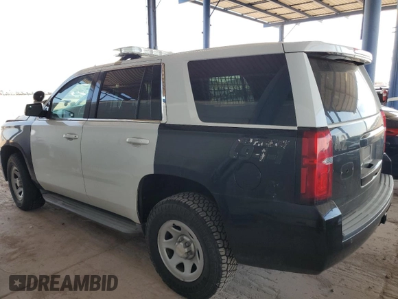 2015 Chevrolet Tahoe Commercial with VIN 1GNSK3EC6FR584004, listed as a Copart auction lot 53166265 with Not provided miles and Salvage title. Bid and sale history available at DreamBid. Image 2.