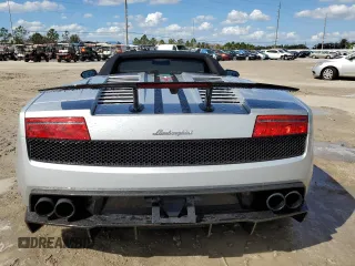 2013 Lamborghini Gallardo z VIN ZHWGU8AJ7DLA12671, wystawiony jako Copart lot #75721804 z przebiegiem 14 849 mil mil oraz Nie do naprawy. Historia ofert i sprzedaży dostępna na DreamBid. Obrazek 6.
