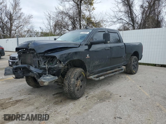 2014 Ram 2500 SLT with VIN 3C6UR5DL1EG213543, listed as a Copart auction lot 81848034 with 164,619 mi miles and Salvage title. Bid and sale history available at DreamBid. Image 1.