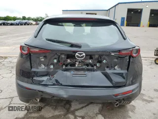 2021 Mazda CX-30 S with VIN 3MVDMAAL5MM303863, listed as a Copart auction lot 54946935 with 71,968 mi miles and Salvage title. Bid and sale history available at DreamBid. Image 6.