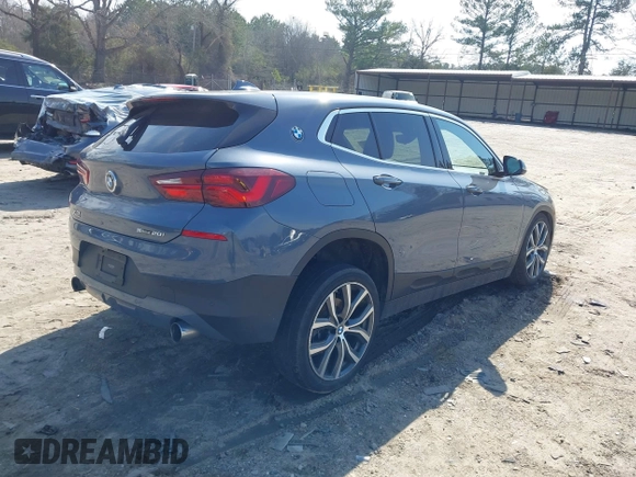 2022 BMW X2 sDrive28i with VIN WBXYH9C06N5T66960, listed as a IAAI auction lot 41800229 with 80,361 mi miles. Bid and sale history available at carsss.com. Image 4.