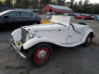 1971 Volkswagen Beetle with VIN 1112313102, listed as a Copart auction lot 82938124 with 3,677 mi miles and Salvage Title. Bid and sale history available at DreamBid. Image 1.