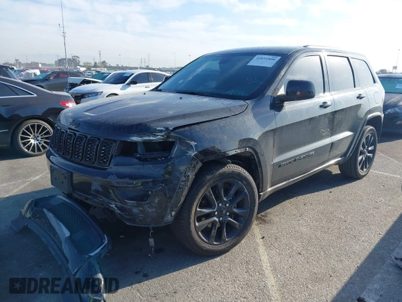 2018 Jeep Grand Cherokee Altitude with VIN 1C4RJEAG2JC430688, listed as a IAAI auction lot 41851808 with 82,959 mi miles. Bid and sale history available at carsss.com. Image 2.