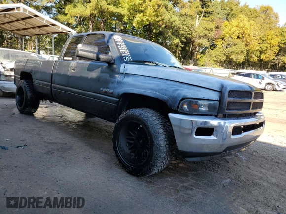 1999 Dodge Ram 2500 with VIN 1B7KC2368XJ548487, listed as a Copart auction lot 77256244 with 301,818 mi miles and Salvage Title. Bid and sale history available at carsss.com. Image 4.