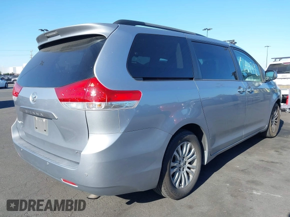 2013 Toyota Sienna XLE AAS with VIN 5TDYK3DC8DS318180, listed as a IAAI auction lot 42374479 with 189,977 mi miles and . Bid and sale history available at DreamBid. Image 4.
