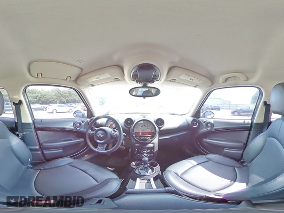 2014 MINI Countryman S with VIN WMWZC3C57EWP25099, listed as a Copart auction lot 62646555 with 153,059 mi miles and Salvage title. Bid and sale history available at DreamBid. Image 14.