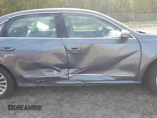 2016 Volkswagen Passat SE z VIN 1VWBS7A39GC048588, wystawiony jako IAAI lot #42024717 z przebiegiem 94 626 mil mil oraz . Historia ofert i sprzedaży dostępna na DreamBid. Obrazek 13.