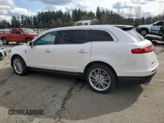 2014 Lincoln MKT EcoBoost with VIN 2LMHJ5ATXEBL58623, listed as a Copart auction lot 48222015 with 255,495 mi miles and Clean Title. Bid and sale history available at DreamBid. Image 2.