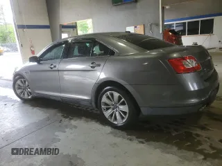 2012 Ford Taurus Limited with VIN 1FAHP2FW3CG113920, listed as a Copart auction lot 55565615 with 131,981 mi miles and Salvage title. Bid and sale history available at DreamBid. Image 2.