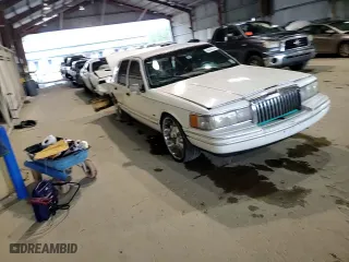 1994 Lincoln Town Car Signature with VIN 1LNLM82W7RY781174, listed as a Copart auction lot 69642754 with 149,185 mi miles and Salvage Title. Bid and sale history available at carsss.com. Image 11.