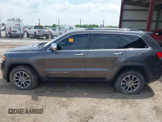 2014 Jeep Grand Cherokee Limited z VIN 1C4RJFBG5EC431229, wystawiony jako IAAI lot #42436481 z przebiegiem 102 442 mil mil oraz . Historia ofert i sprzedaży dostępna na DreamBid. Obrazek 14.