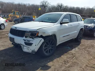 2017 Jeep Grand Cherokee Altitude with VIN 1C4RJFAG8HC768449, listed as a IAAI auction lot 41777272 with 72,913 mi miles and . Bid and sale history available at DreamBid. Image 2.