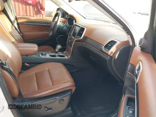 2016 Jeep Grand Cherokee Summit with VIN 1C4RJFJG3GC318626, listed as a IAAI auction lot 40737019 with 92,880 mi miles and . Bid and sale history available at DreamBid. Image 5.