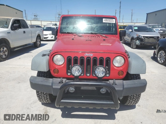 2011 Jeep Wrangler Sport with VIN 1J4AA2D19BL574527, listed as a Copart auction lot 49920225 with 121,730 mi miles and Clean Title. Bid and sale history available at carsss.com. Image 5.
