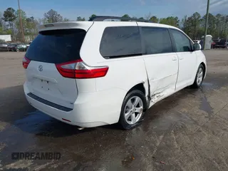 2015 Toyota Sienna LE AAS with VIN 5TDKK3DC2FS590667, listed as a IAAI auction lot 41997673 with 169,828 mi miles. Bid and sale history available at carsss.com. Image 4.
