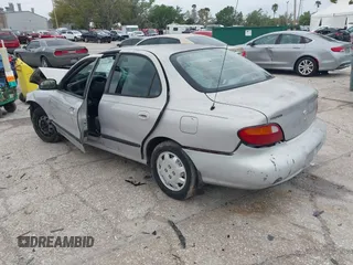1998 Hyundai Elantra with VIN KMHJF24M7WU672436, listed as a IAAI auction lot 41763627 with 114,288 mi miles and . Bid and sale history available at DreamBid. Image 3.