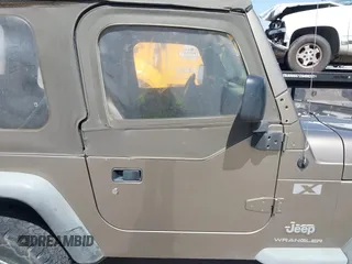 2003 Jeep Wrangler X with VIN 1J4FA39S03P312550, listed as a IAAI auction lot 41837150 with 127,239 mi miles and . Bid and sale history available at DreamBid. Image 13.