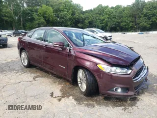 2013 Ford Fusion SE Hybrid z VIN 3FA6P0LU7DR197801, wystawiony jako Copart lot #60468095 z przebiegiem 169 215 mil mil oraz Szkoda całkowita • Salvage title. Historia ofert i sprzedaży dostępna na DreamBid. Obrazek 4.