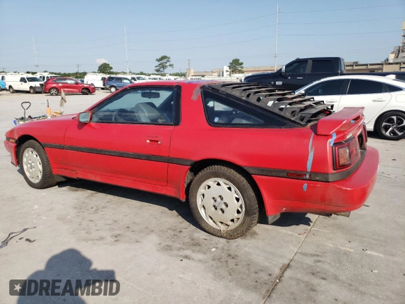 1988 Toyota Supra z VIN JT2MA71JXJ0094266, wystawiony jako Copart lot #59028715 z przebiegiem 133 654 mil mil oraz Czysty tytuł • Clean title. Historia ofert i sprzedaży dostępna na DreamBid. Obrazek 2.