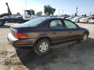 1997 Dodge Stratus z VIN 1B3EJ46X5VN540079, wystawiony jako Copart lot #73252534 z przebiegiem Nie podano mil oraz Tytuł czysty. Historia ofert i sprzedaży dostępna na DreamBid. Obrazek 3.