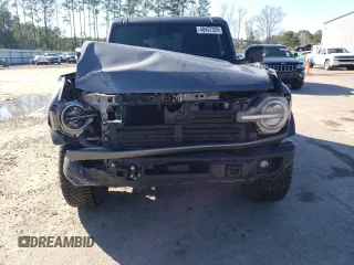 2023 Ford Bronco z VIN 1FMEE5DP0PLB62405, wystawiony jako Copart lot #48457335 z przebiegiem 56 998 mil mil oraz Szkody całkowita. Historia ofert i sprzedaży dostępna na DreamBid. Obrazek 5.