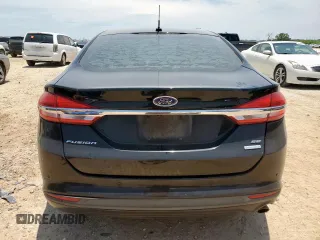 2018 Ford Fusion SE z VIN 3FA6P0HD5JR252718, wystawiony jako Copart lot #60549335 z przebiegiem 120 807 mil mil oraz Czysty tytuł • Clean title. Historia ofert i sprzedaży dostępna na DreamBid. Obrazek 6.