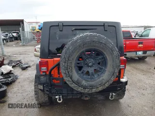 2015 Jeep Wrangler Unlimited Sahara with VIN 1C4BJWEG6FL603265, listed as a IAAI auction lot 41956606 with 70,983 mi miles. Bid and sale history available at carsss.com. Image 16.