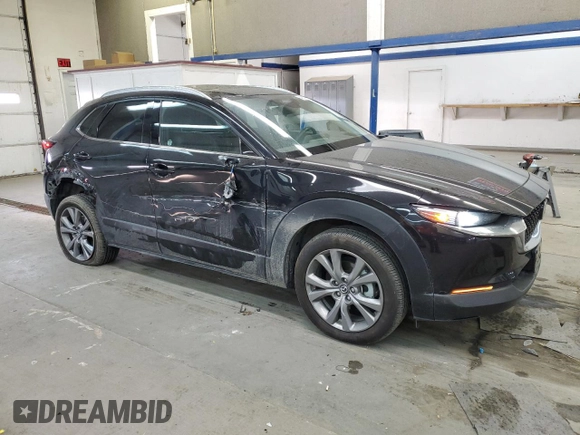 2024 Mazda CX-30 S Premium with VIN 3MVDMBDM5RM604036, listed as a Copart auction lot 43321745 with 11,992 mi miles and Salvage Title. Bid and sale history available at DreamBid. Image 4.