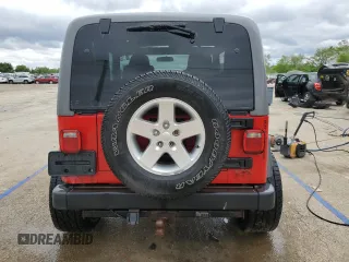 2005 Jeep Wrangler Sport z VIN 1J4FA49S75P317995, wystawiony jako Copart lot #58060055 z przebiegiem 189 332 mil mil oraz Szkoda całkowita • Salvage title. Historia ofert i sprzedaży dostępna na DreamBid. Obrazek 6.