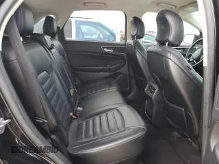 2016 Ford Edge SEL z VIN 2FMPK3J94GBC11035, wystawiony jako Copart lot #53708355 z przebiegiem 101 416 mil mil oraz Czysty tytuł • Clean title. Historia ofert i sprzedaży dostępna na DreamBid. Obrazek 11.