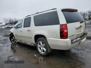 2012 Chevrolet Suburban LTZ with VIN 1GNSKKE77CR326213, listed as a Copart auction lot 44882115 with 132,842 mi miles and Salvage Title. Bid and sale history available at carsss.com. Image 2.