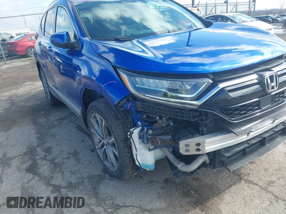 2020 Honda CR-V Touring with VIN 7FARW2H91LE012284, listed as a IAAI auction lot 41672460 with 28,207 mi miles and . Bid and sale history available at DreamBid. Image 18.