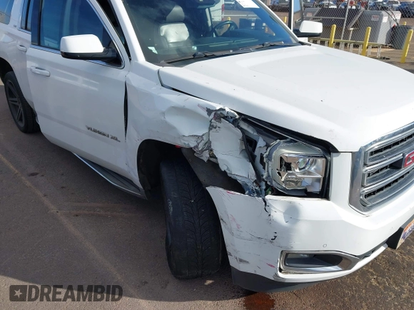 2015 GMC Yukon XL SLT with VIN 1GKS1HKC2FR612690, listed as a IAAI auction lot 41234188 with 113,830 mi miles. Bid and sale history available at carsss.com. Image 6.