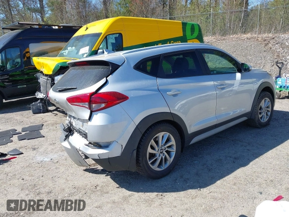 2018 Hyundai Tucson SEL with VIN KM8J3CA42JU771483, listed as a IAAI auction lot 42159936 with 91,604 mi miles and . Bid and sale history available at DreamBid. Image 4.