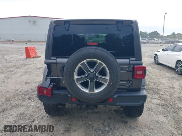 2018 Jeep Wrangler Unlimited Sahara with VIN 1C4HJXEN8JW303023, listed as a IAAI auction lot 42138631 with 72,463 mi miles and . Bid and sale history available at DreamBid. Image 16.