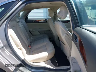 2016 Lincoln MKZ Hybrid with VIN 3LN6L2LU8GR613310, listed as a IAAI auction lot 41986892 with 114,087 mi miles. Bid and sale history available at carsss.com. Image 8.