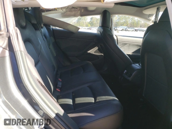 2019 Tesla Model 3 Mid Range with VIN 5YJ3E1EA1KF435295, listed as a Copart auction lot 49552685 with 56,366 mi miles and Salvage Title. Bid and sale history available at DreamBid. Image 10.