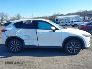 2017 Mazda CX-5 Grand Touring with VIN JM3KFBDL6H0188517, listed as a IAAI auction lot 41093178 with 98,831 mi miles. Bid and sale history available at carsss.com. Image 13.