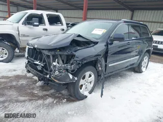 2011 Jeep Grand Cherokee Laredo with VIN 1J4RR4GG0BC610046, listed as a IAAI auction lot 41730587 with 177,032 mi miles. Bid and sale history available at carsss.com. Image 17.