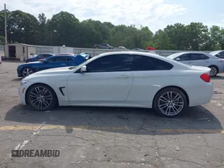 2015 BMW 4 Series 428i z VIN WBA3N3C55FK233907, wystawiony jako IAAI lot #42335053 z przebiegiem 45 000 mil mil oraz . Historia ofert i sprzedaży dostępna na DreamBid. Obrazek 13.
