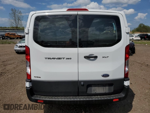 2021 Ford Transit Passenger XL z VIN 1FBAX2Y88MKA30996, wystawiony jako Copart lot #52709324 z przebiegiem 86 753 mil mil oraz Szkoda całkowita • Salvage title. Historia ofert i sprzedaży dostępna na DreamBid. Obrazek 6.