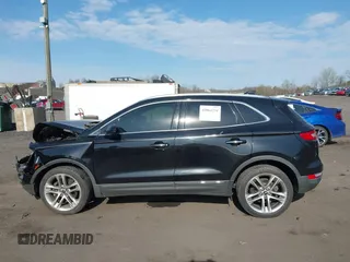 2019 Lincoln MKC Reserve with VIN 5LMCJ3D96KUL46773, listed as a IAAI auction lot 42064234 with 70,176 mi miles and . Bid and sale history available at DreamBid. Image 14.