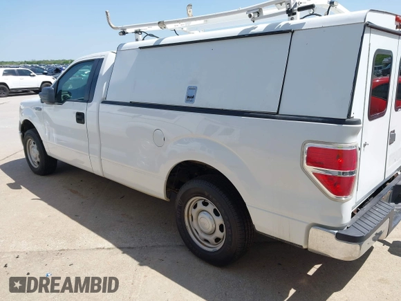 2012 Ford F-150 XL with VIN 1FTMF1CM7CKE24675, listed as a IAAI auction lot 41884476 with 127,455 mi miles. Bid and sale history available at carsss.com. Image 3.